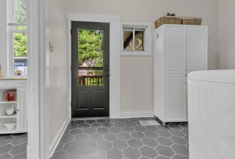 Hexagonal tile flooring throughout
