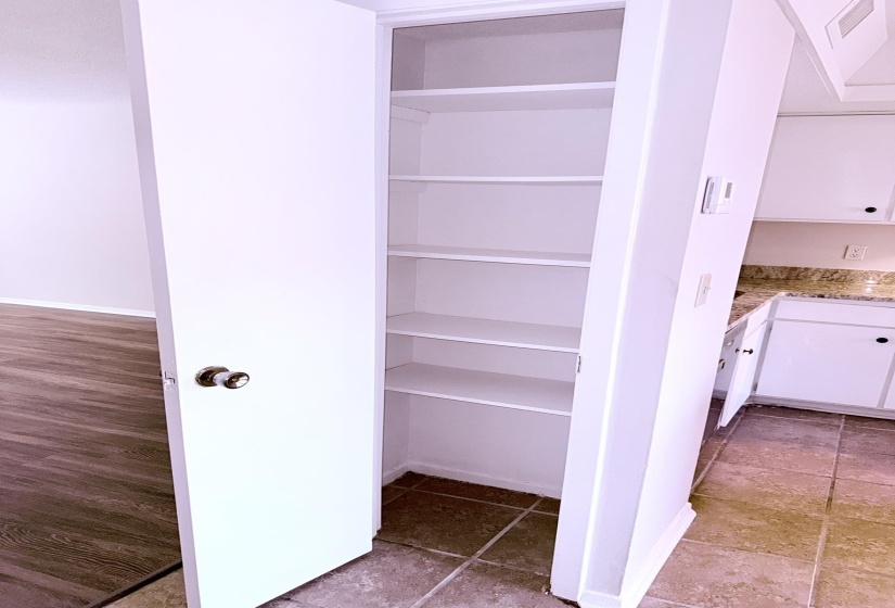 Built-in pantry with five adjustable shelves