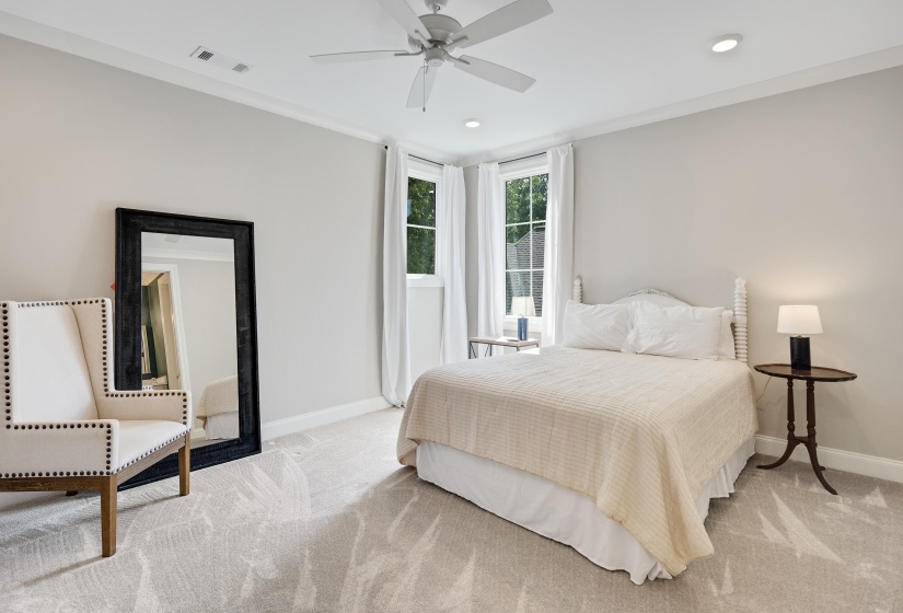 Neutral paint palette with crown molding and recessed lighting