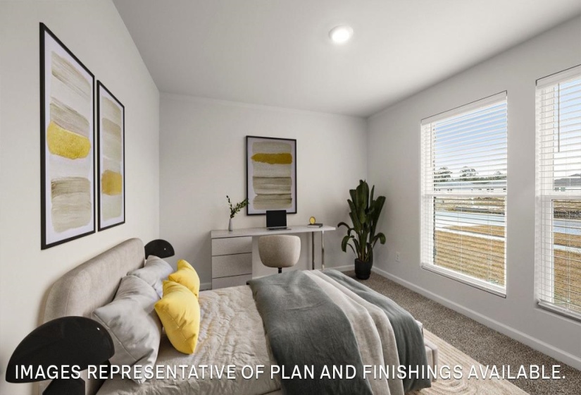 Bedroom with carpet floors and baseboards