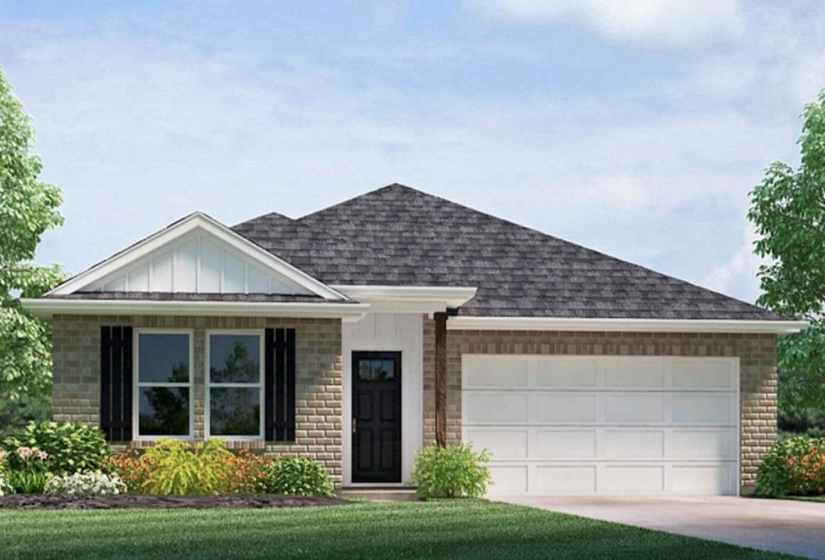 View of front of home with brick siding, a garage, and board and batten siding
