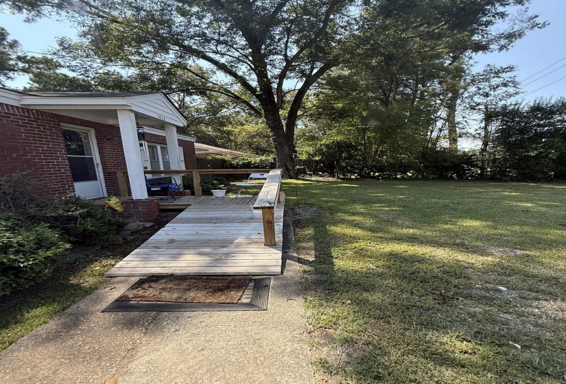 Brick exterior with a covered porch entry