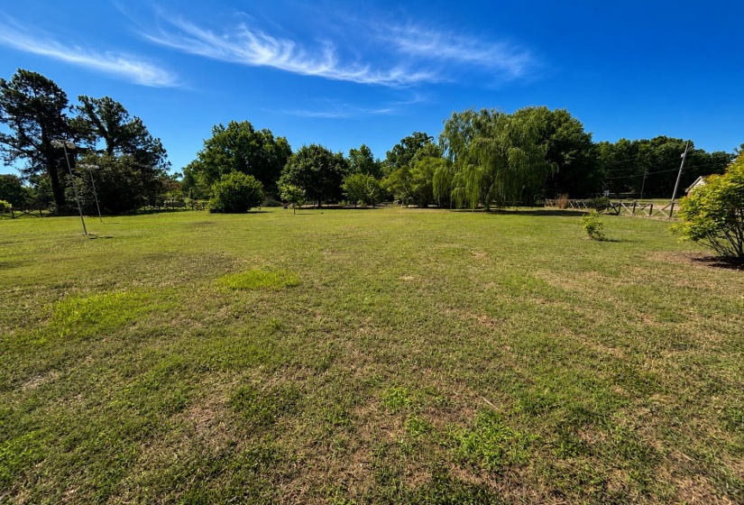Expansive green lawn providing ample open space