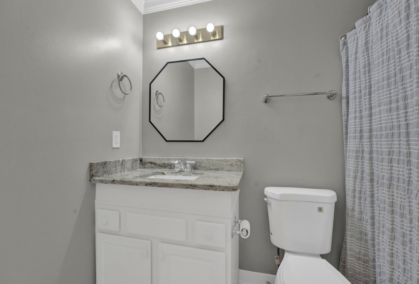 Bathroom featuring toilet and vanity