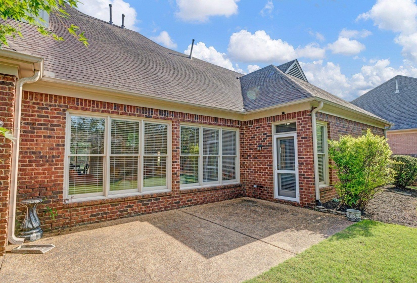 Rear view of property featuring a patio area