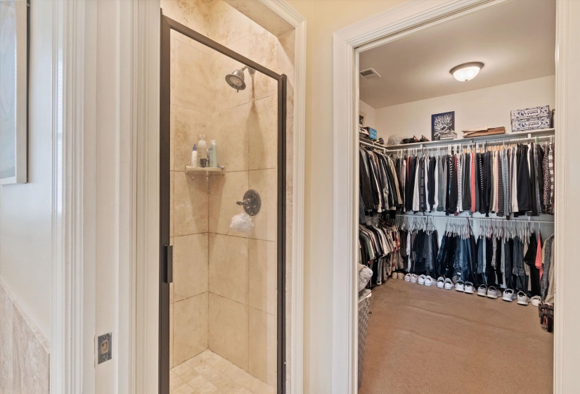 Tile shower with bronze-finish frame and fixtures