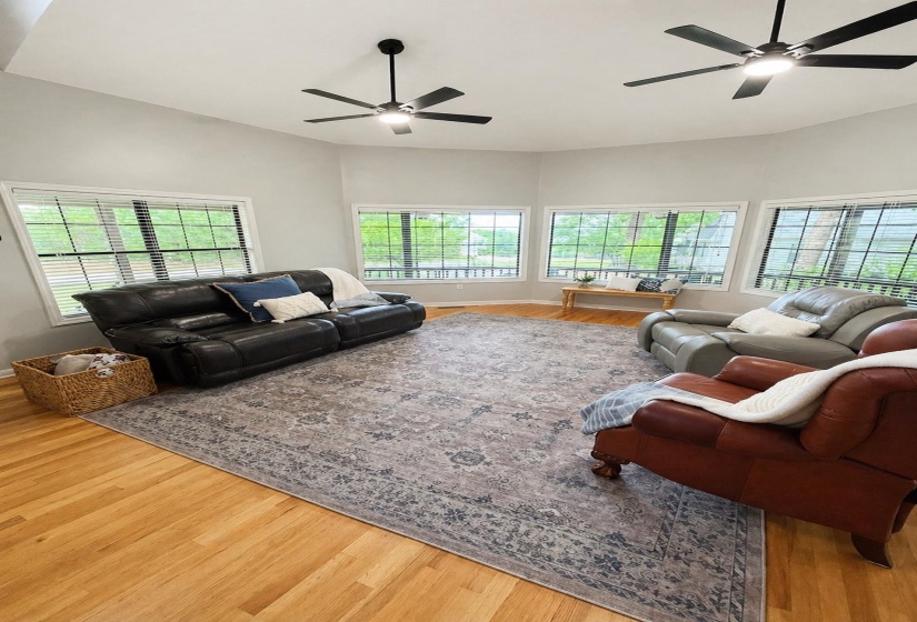 Vaulted ceiling with multiple ceiling fans