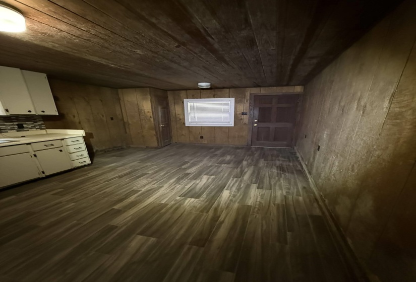Wood-finish plank flooring throughout