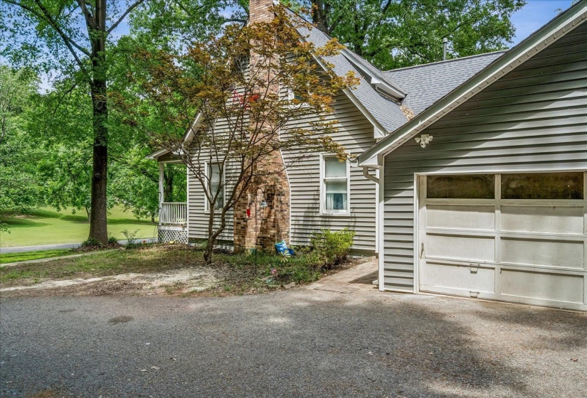 2 car Garage-attached and additional parking with portable carport.