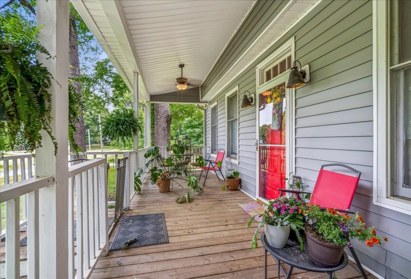 Amazing Covered Front Porch Spans entire front of Home.