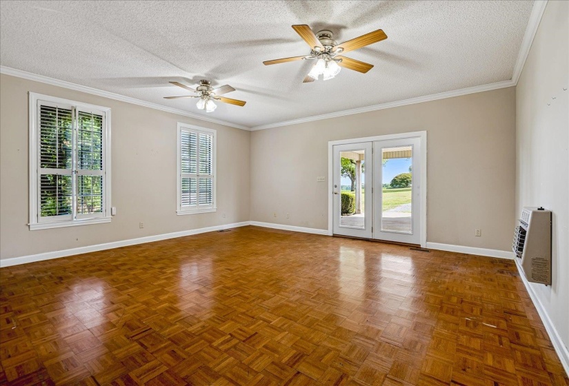 located on first floor. Hardwood floors,back up heat on wall in case of power outage.