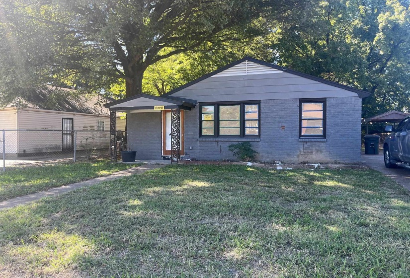 View of front of home with brick siding