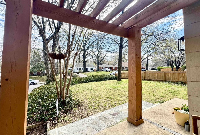 View of yard featuring a pergola and a patio