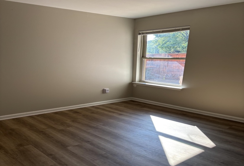 There's window that provides light and a view of the patio