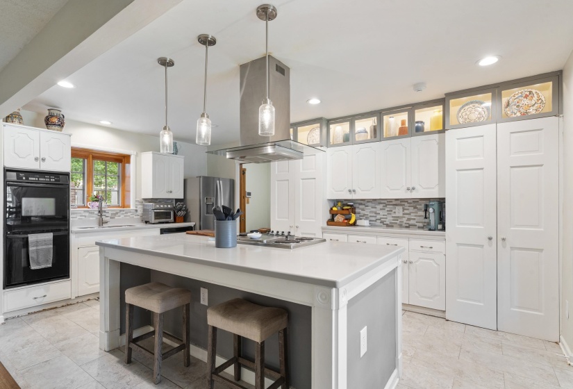 Central kitchen island with a light-toned countertop