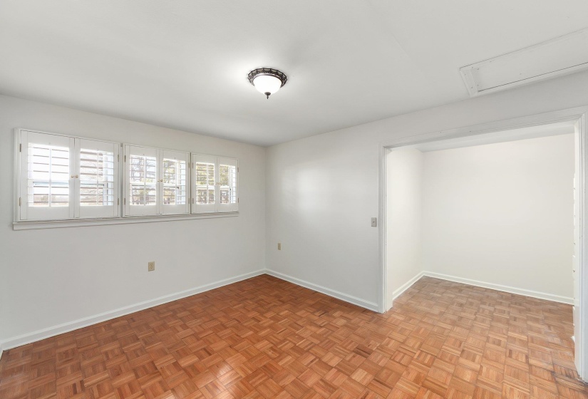Unfurnished room with baseboards