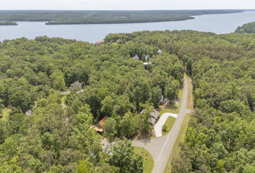 Expansive wooded acreage featuring two distinct residential structures