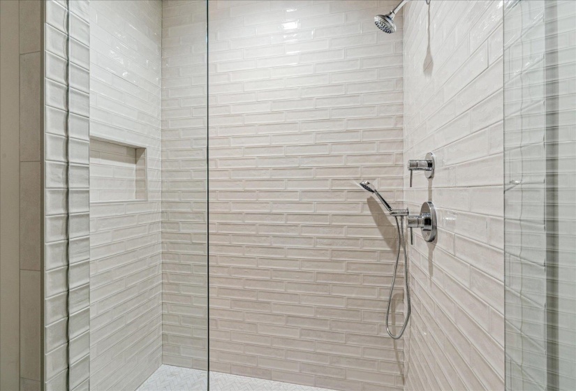 Full bathroom featuring a stall shower