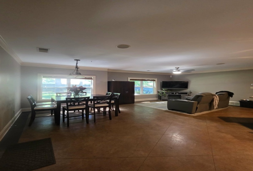 Open-concept living area featuring a dining space and a lounge area
