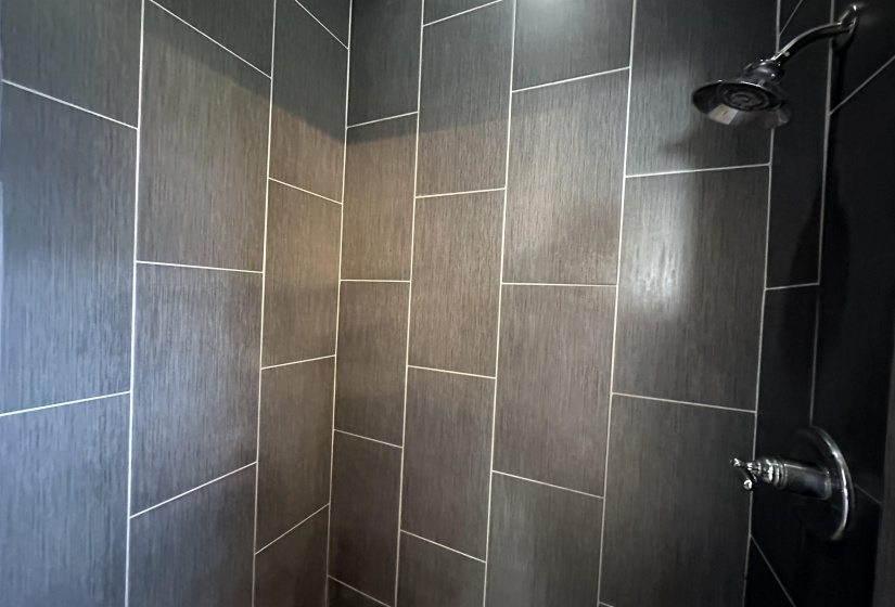 Bathroom view of tiled shower