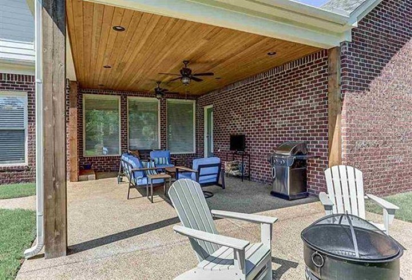 View of patio featuring grilling area and ceiling fan