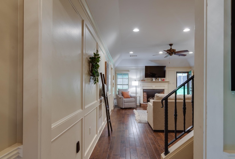 Entryway featuring wainscoting and wood-finish flooring