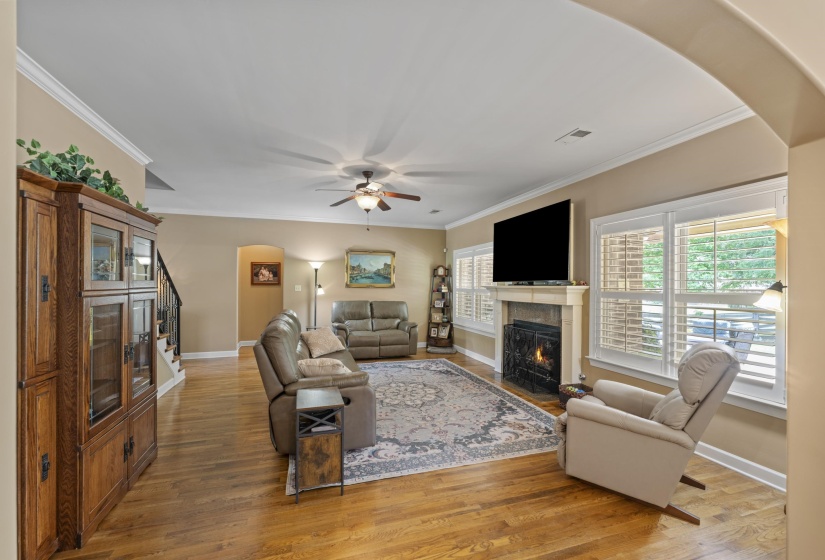 Large great room designed for comfortable living and entertaining with abundant natural light and timeless finishes.