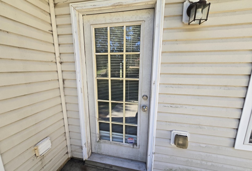 White French-style exterior door with integrated blinds