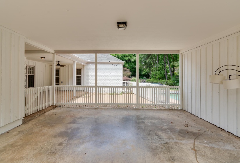 2-car carport and fenced in patio.
