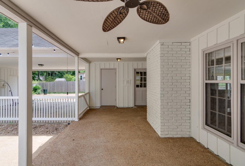 Covered patio featuring an exposed aggregate concrete surface