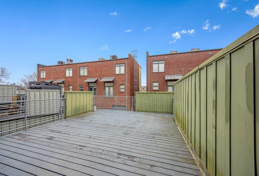 Wooden deck with a storage unit
