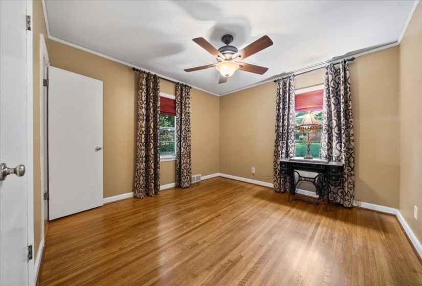 2nd Primary Bedroom featuring light wood-style floors, ornamental molding, and ceiling fan