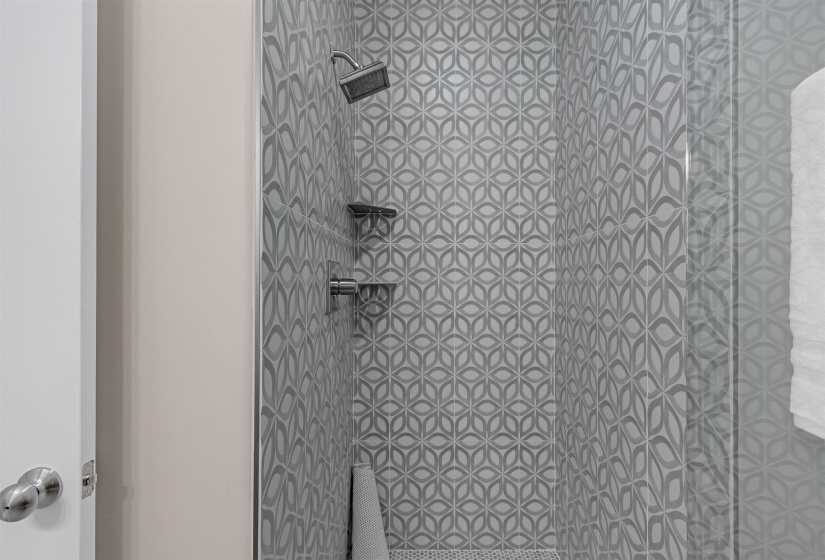 Bathroom with a tile shower