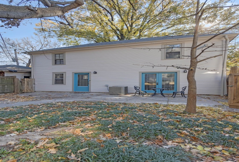 Rear view of property with french doors, central air condition unit, and a patio area
