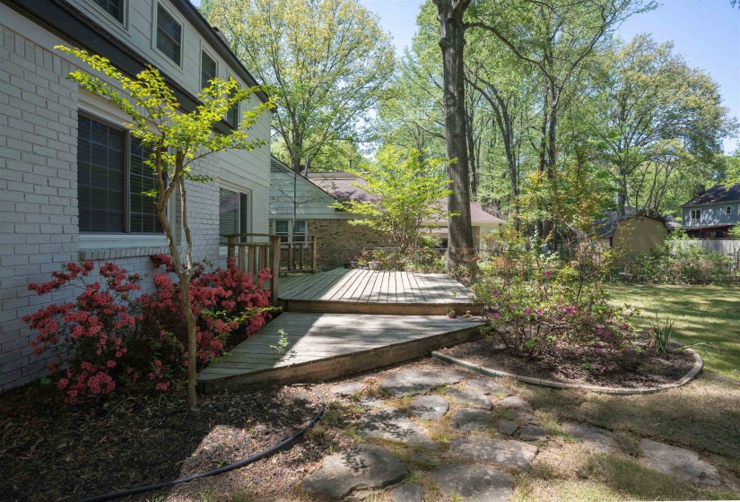 View of yard with a deck
