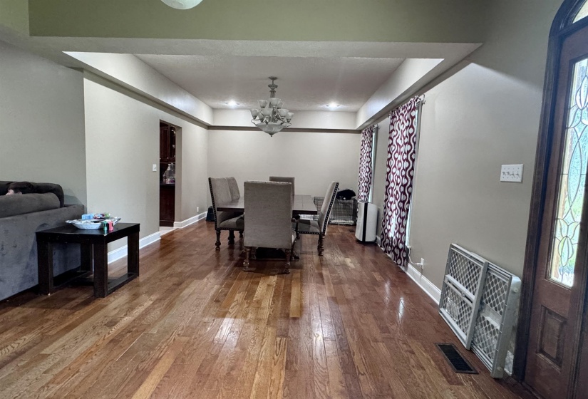 Hardwood flooring extending throughout the space