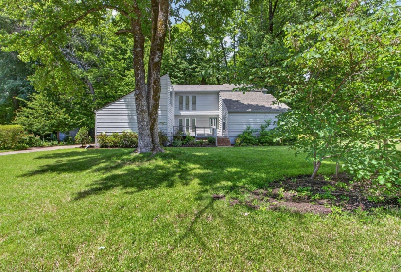 Clean architectural lines, expansive windows and warm natural elements create striking curb appeal, while the meticulously maintained exterior reflects pride of ownership and timeless style!