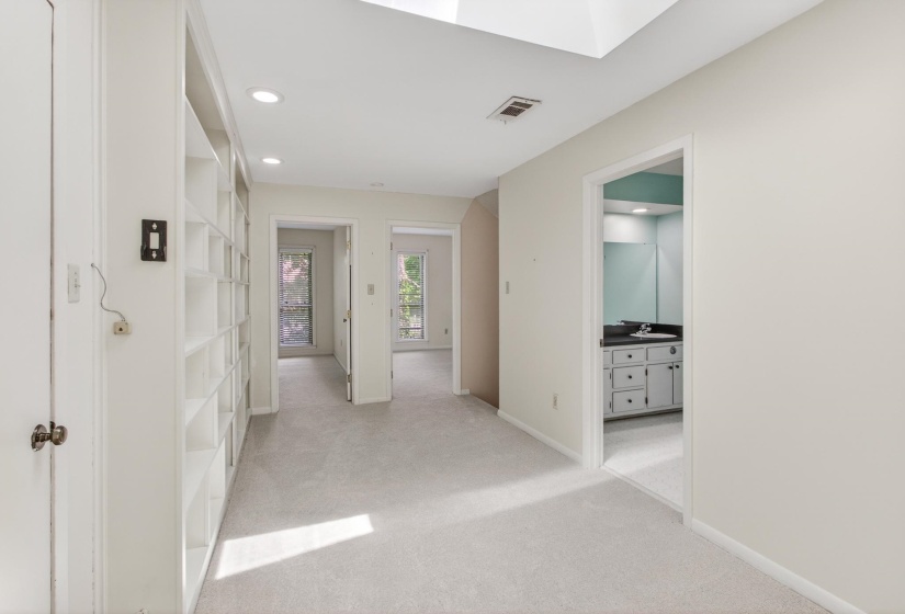 An opposing view of the fantastic loft space, looking towards the 3rd and 4th bedrooms and the full bath up.