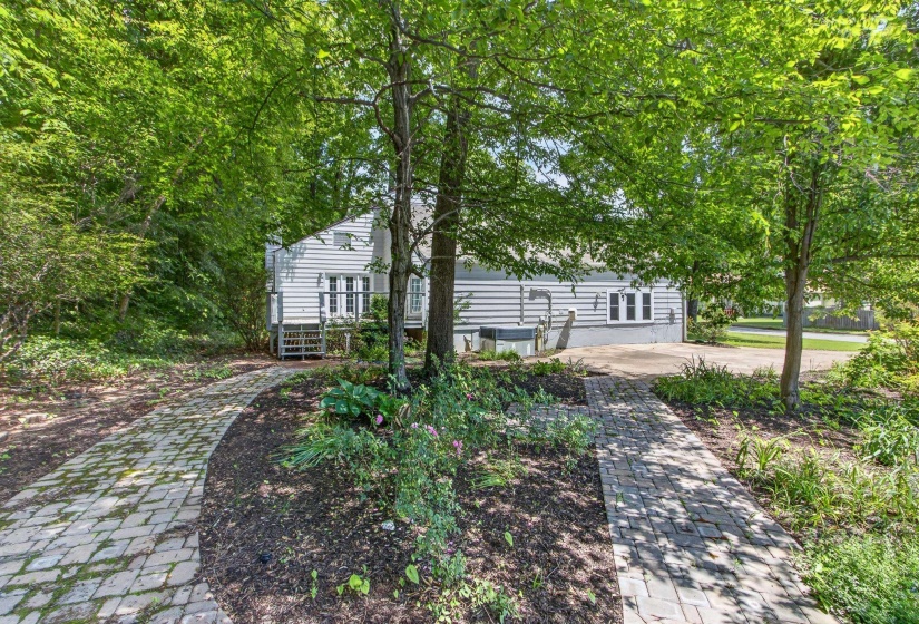 Another view of the shady, beautiful grounds.  The home has been protected by Terminix and the termite contract is transferrable to the new owner.