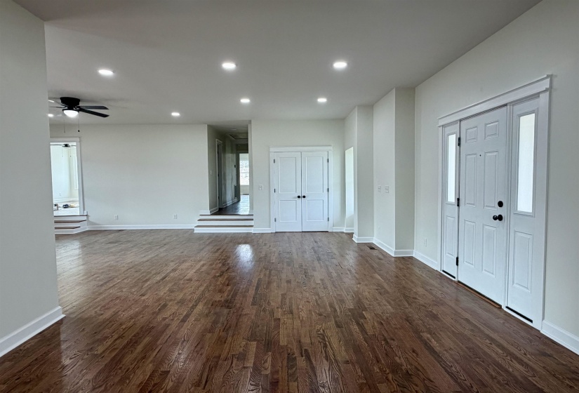 Foyer entrance featuring dark wood finished floors, recessed lighting, and a ceiling fan