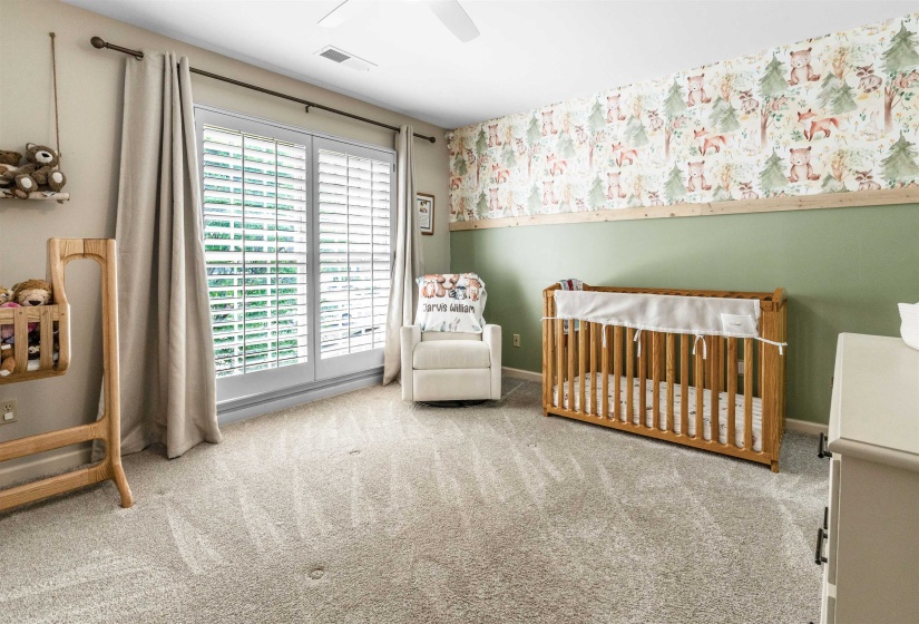 Light-colored carpeted flooring with a neutral wall palette