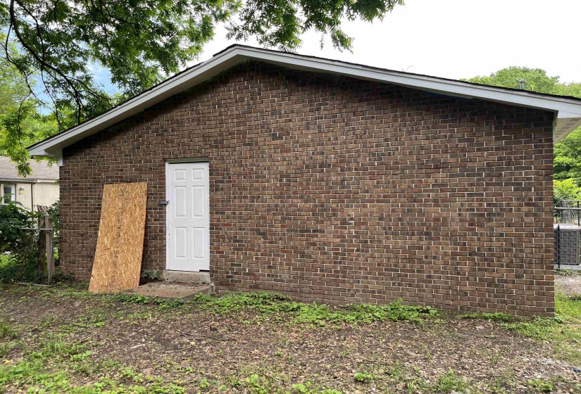 View of home's exterior with brick siding