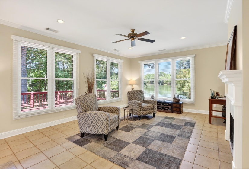 Relax in the family room and enjoy the beautiful view of the lake.