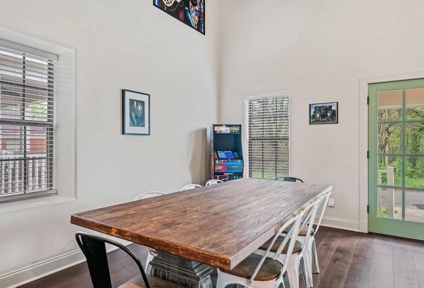 Dining room featuring dark wood-style floors