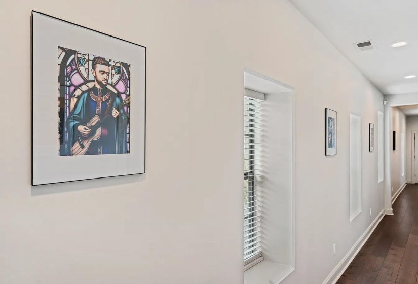 Corridor featuring dark wood-style floors and recessed lighting