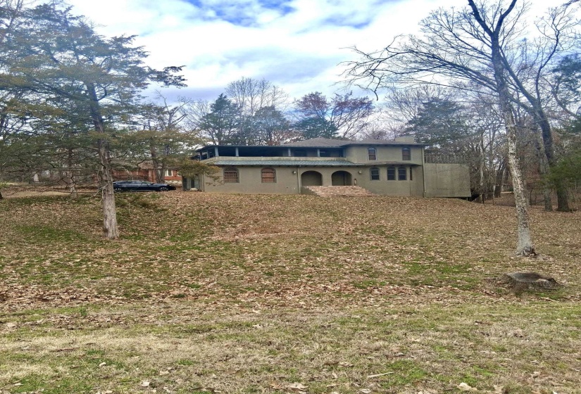 Back of house with stucco siding