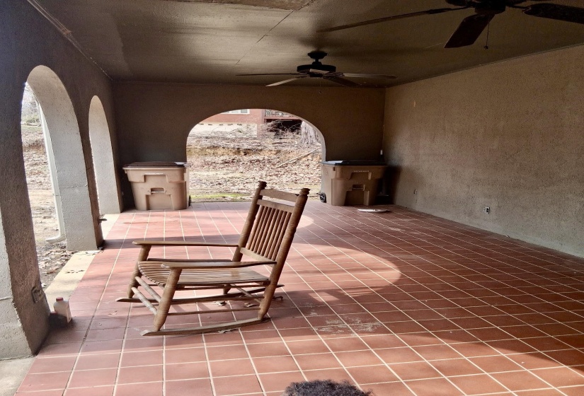 View of patio featuring a ceiling fan