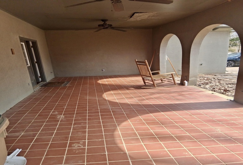 View of patio featuring a ceiling fan