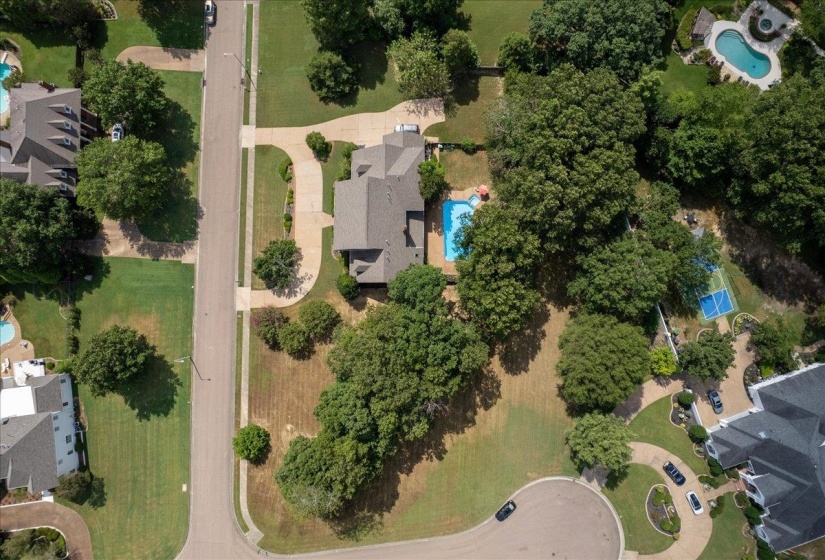 Aerial overview of property's location with a pool