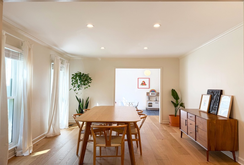 Bright interior space with light-tone wood-finish flooring